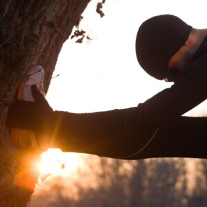 A man stretching his legs.