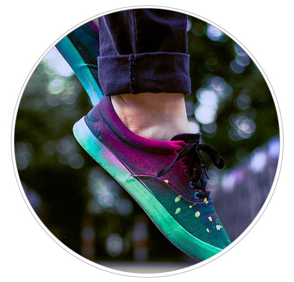 Person jumping in colorful sneakers
