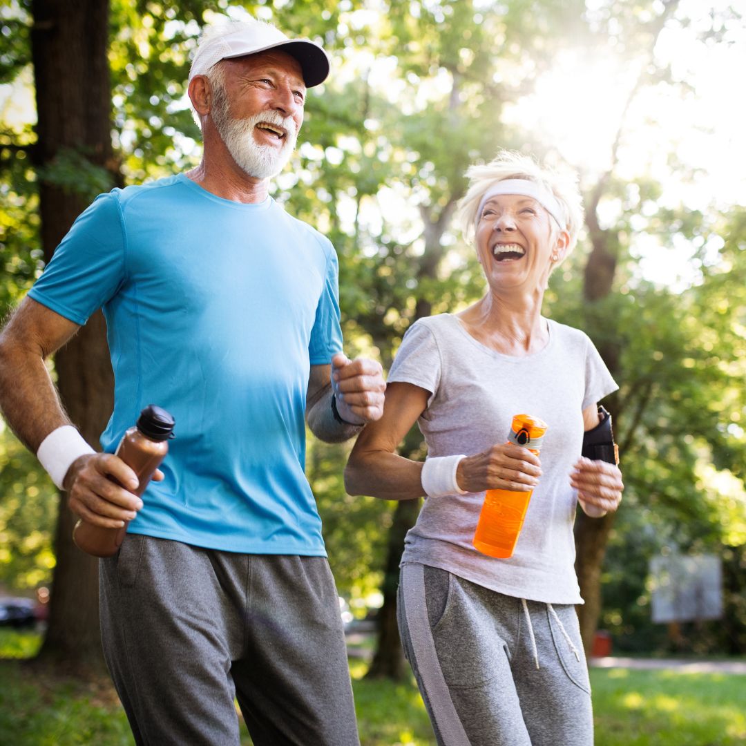 Senior couple running outdoors